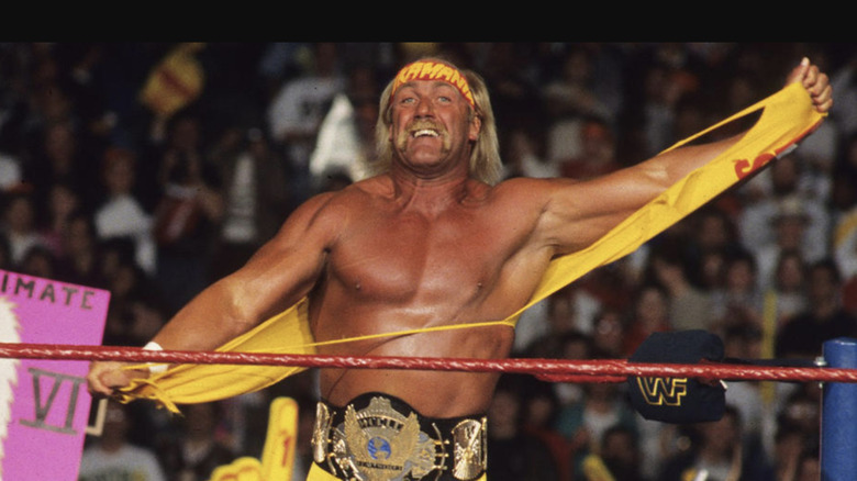 Hulk Hogan rips his trademark yellow shirt off in a WWF ring