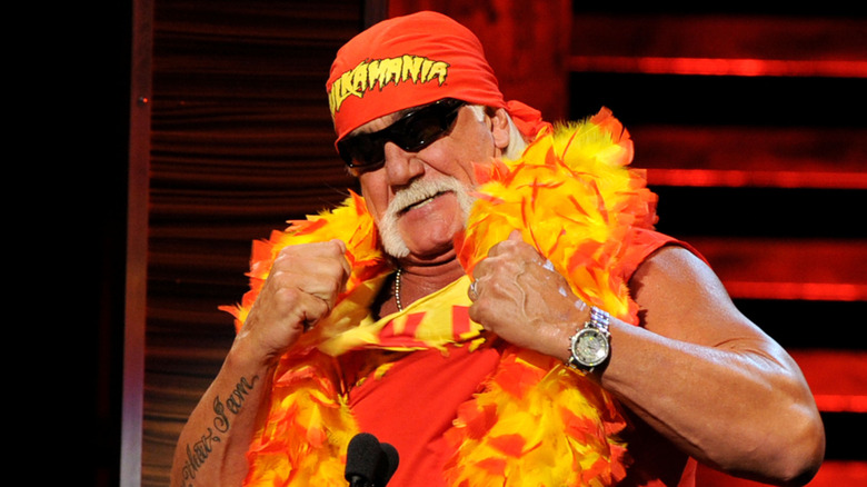 Hulk Hogan rips his trademark yellow shirt off in a WWF ring