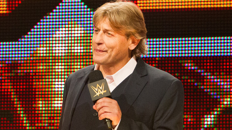 William Regal cuts a promo on the stage during an episode of "WWE NXT."
