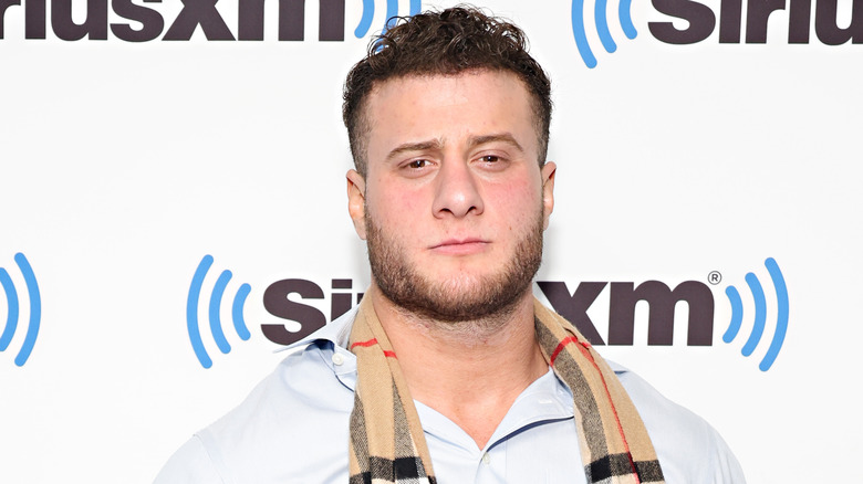 MJF posing in front of SiriusXM banner