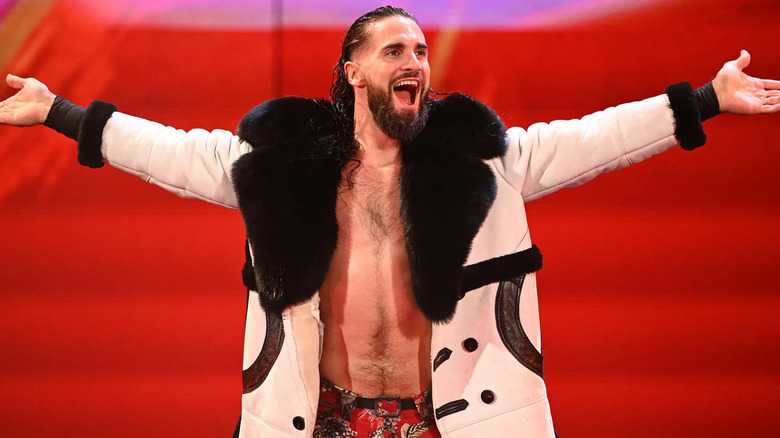 Seth Rollins wearing a black and white jacket
