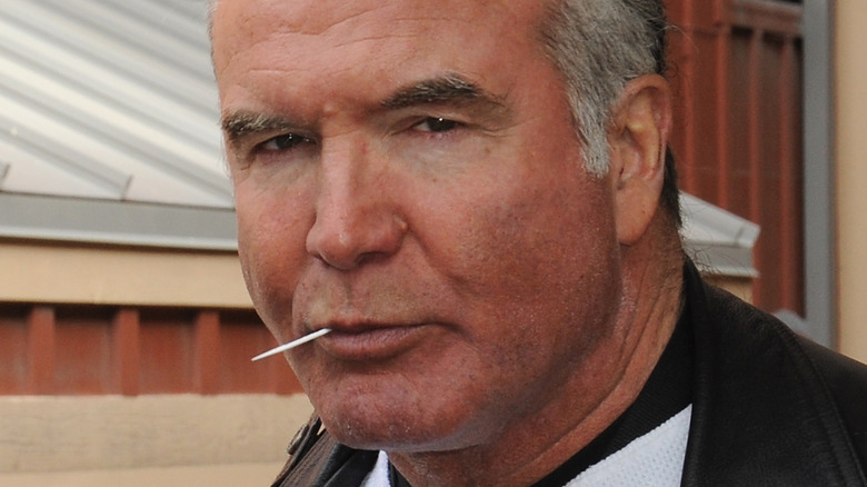 Scott Hall chews toothpick