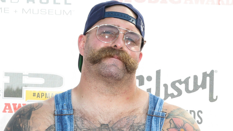 Andy "The Butcher" Williams wearing glasses