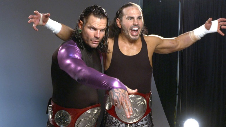 Jeff and Matt Hardy posing with the WWE RAW Tag Team Championships during their last run with the promotion.