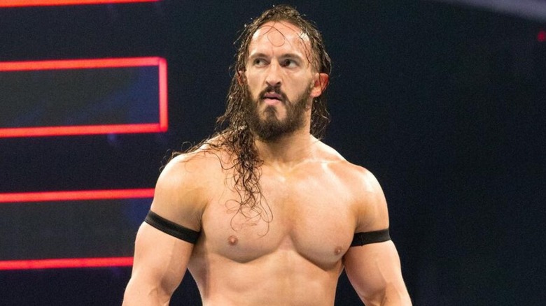 Neville, more recently known as Pac in AEW, stands in the ring and awaits an opponent in the ring during an episode of WWE programming.