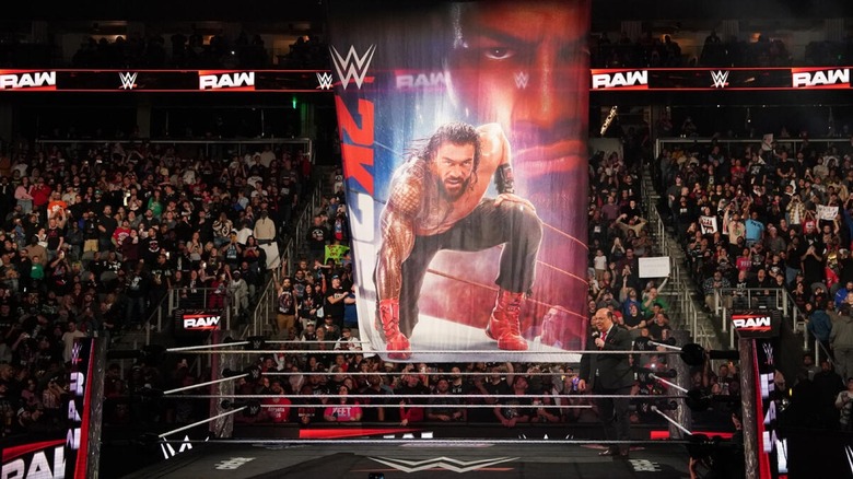 Paul Heyman unveils Roman Reigns as the cover star of WWE 2K25