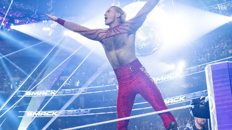 Elton Prince of Pretty Deadline poses on the middle rope before clashing in tag team action on 