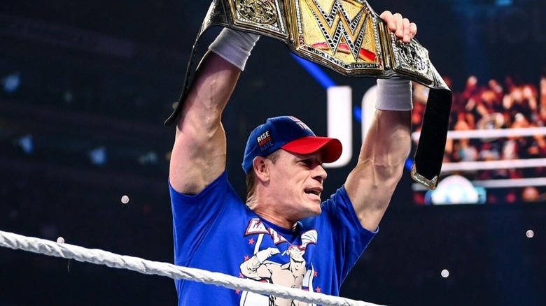 John Cena holds up the Undisputed WWE Championship before his WWE SummerSlam 2025 match against Cody Rhodes.
