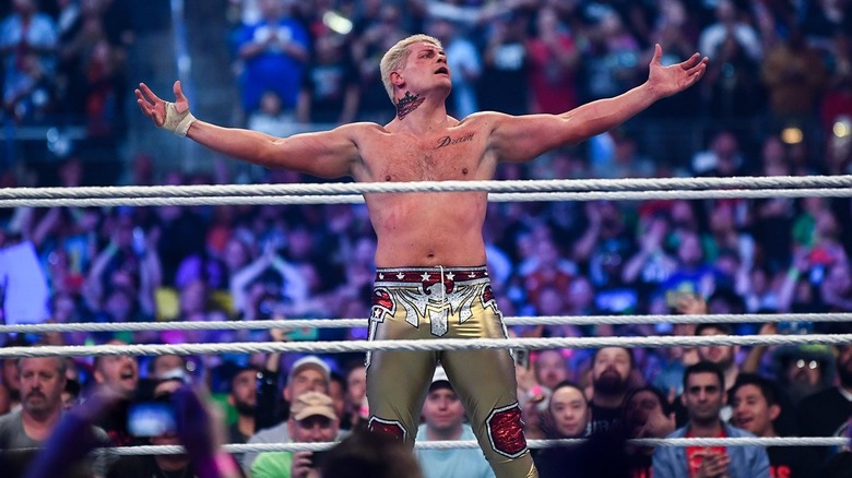 Cody Rhodes celebrates his victory at WrestleMania 
