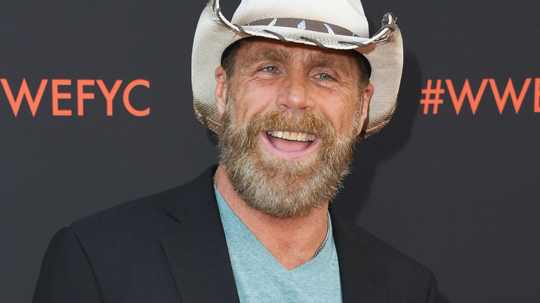 Shawn Michaels is wearing a white cowboy hat