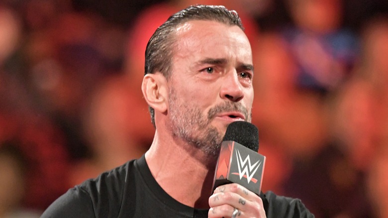 CM Punk appearing on "WWE Raw"