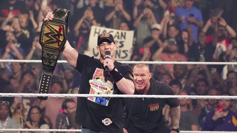 Randy Orton (R) watches John Cena in the ring during Monday Night Raw at T-Mobile Arena on April 21, 2025 in Las Vegas, Nevada.