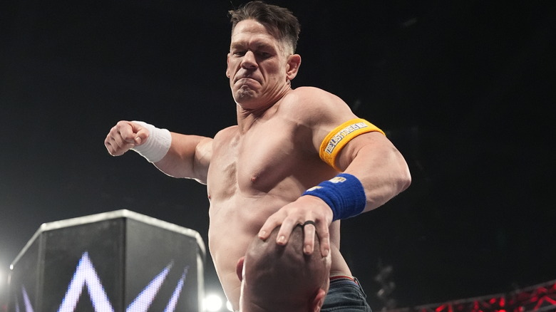 John Cena raises a fist to punch Randy Orton at WWE Backlash