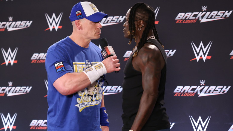 John Cena addresses R-Truth during the WWE Backlash Press Conference at Enterprise Center on May 10, 2025 in St Louis, Missouri.