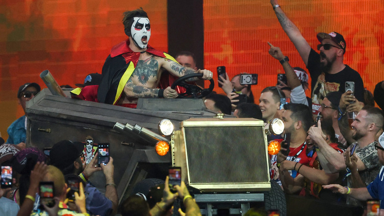 Danhausen rides the Danhausen-mobile to the ring