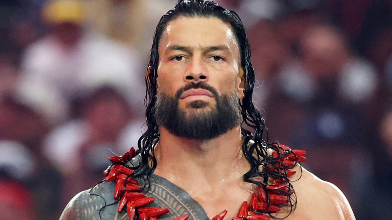 Roman Reigns wearing an Ula Fala