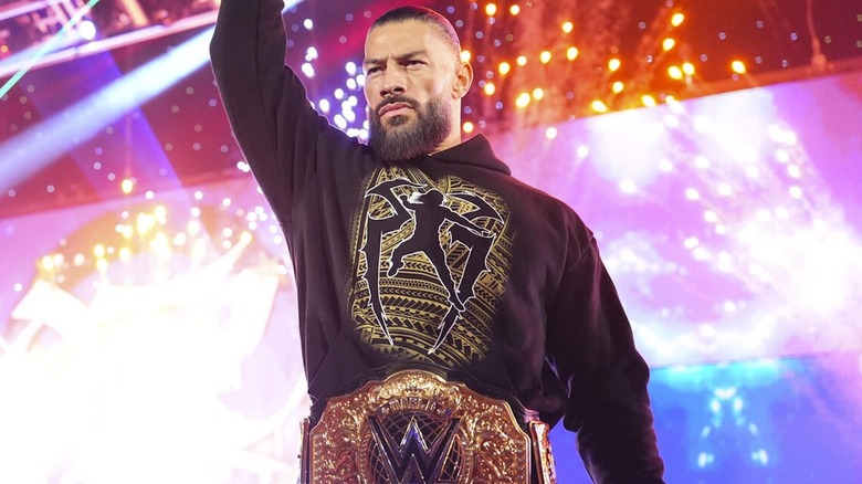 Roman Reigns with an arm in the air on "WWE Raw"