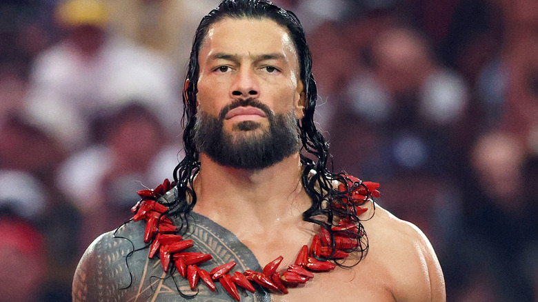 Roman Reigns wearing an Ula Fala