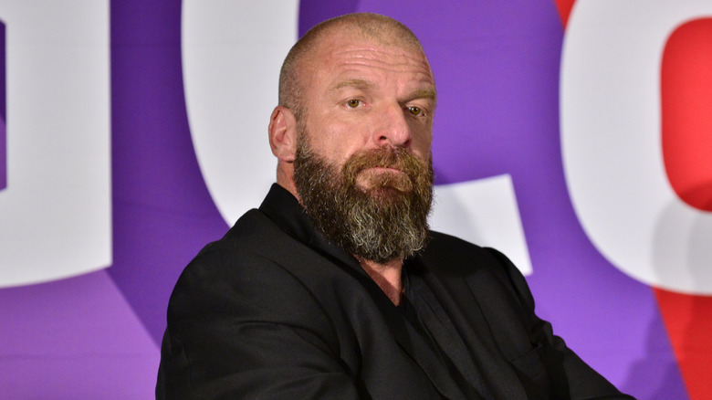WWE CCO Triple H awaits a question during a non-WWE press conference event