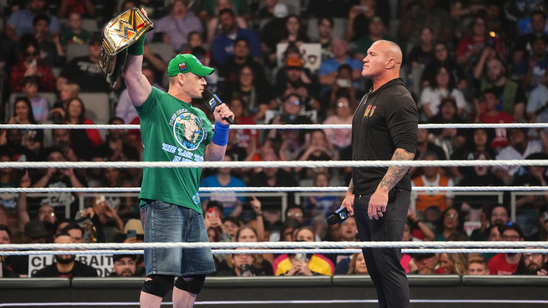 Cena and Orton staring each other down in the ring