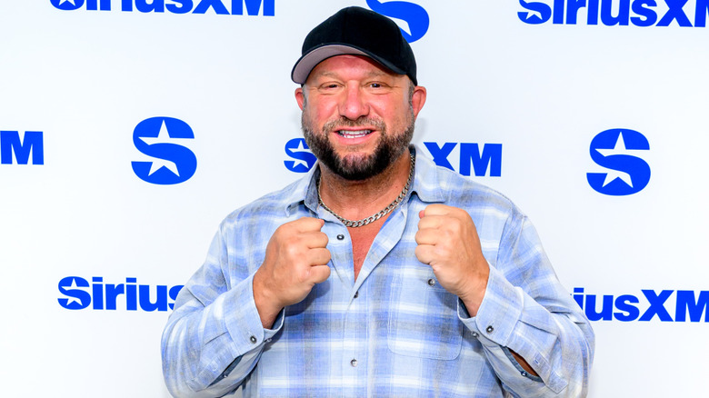 WWE Hall of Famer Bully Ray poses at red carpet event