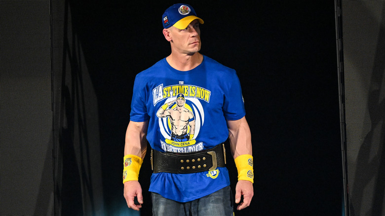 John Cena making his entrance wearing the Undisputed WWE Championship