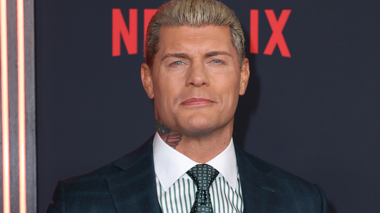 Cody Rhodes wearing a suit