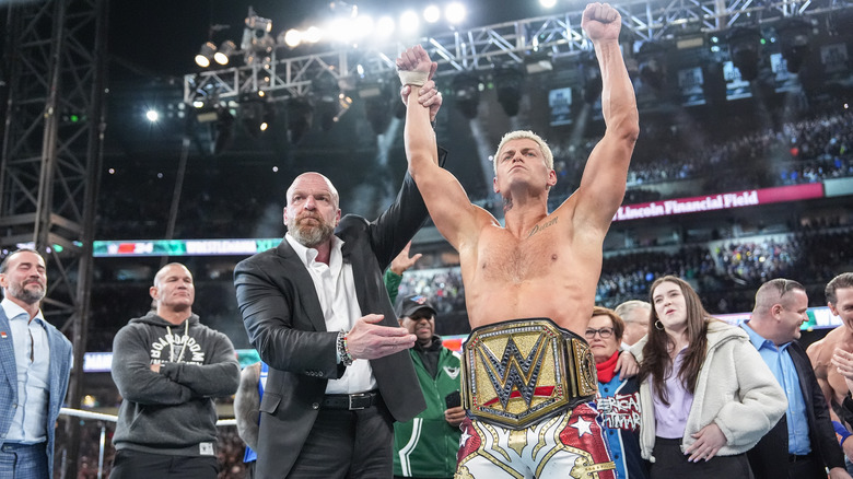 Cody Rhodes celebrating his WrestleMania win