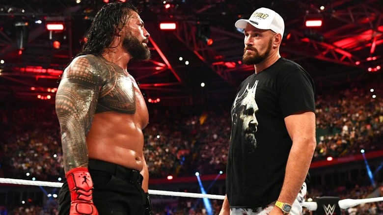 Roman Reigns stares down Tyson Fury at WWE Clash at the Castle 2022