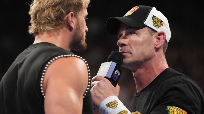 John Cena and Logan Paul face to face during SmackDown at The 3Arena Dublin on August 22, 2025 in Dublin, Ireland.