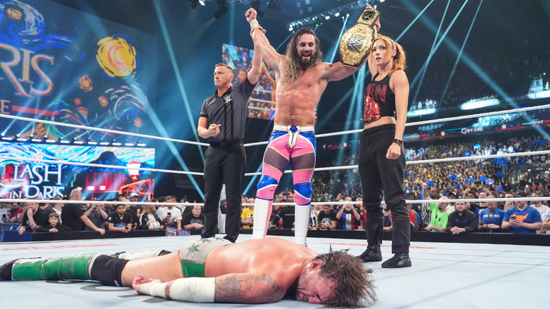 Seth Rollins and Becky Lynch celebrate at Clash in Paris