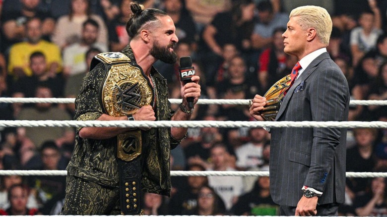 World Heavyweight Champion Seth Rollins cuts a promo on Undisputed WWE Champion Cody Rhodes in the ring during an episode of "WWE Raw."