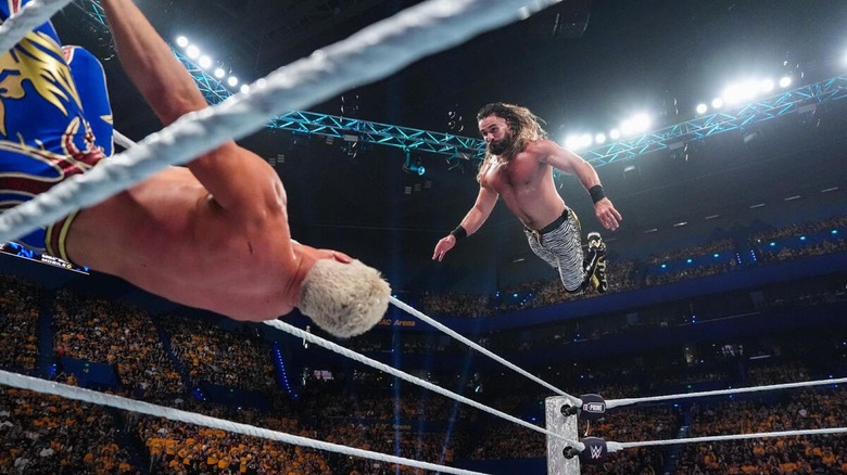 Seth Rollins flies across the ring to headbutt Cody Rhodes at WWE Crown Jewel