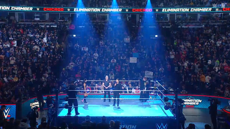 Lee and Lynch in the ring during the ring announcement