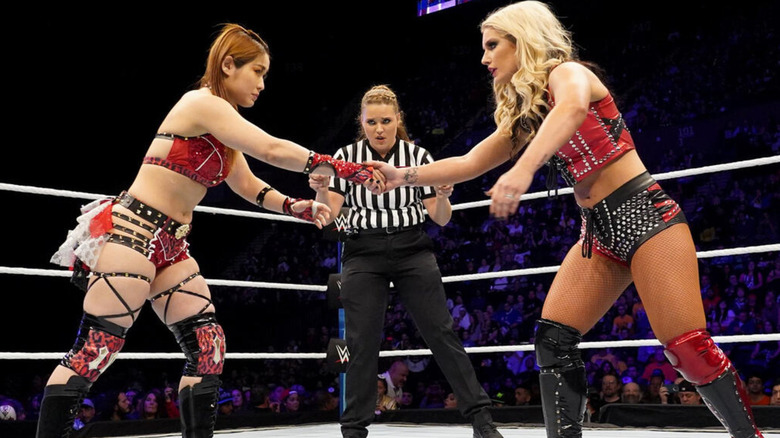 Io Shirai and Toni Storm shaking hands