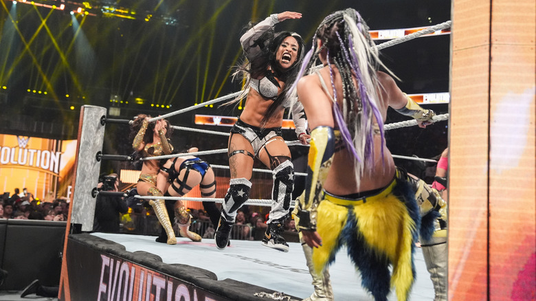 Zelina Vega charges Giulia on the apron