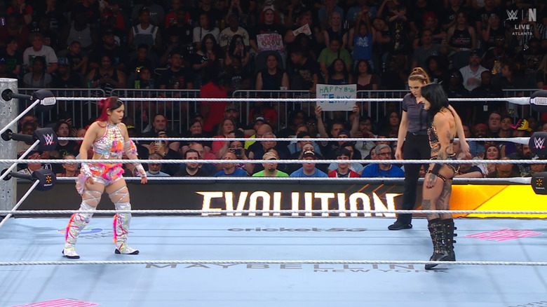 SKY and Ripley staring each other down in the ring