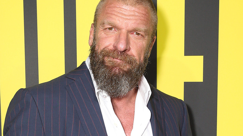 Triple H smirking