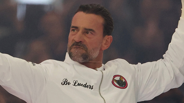 CM Punk poses during his WrestleMania entrance