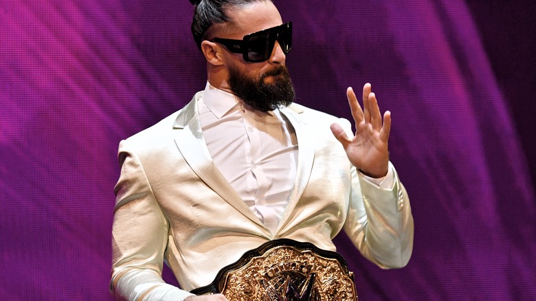 Seth Rollins white suit sunglasses