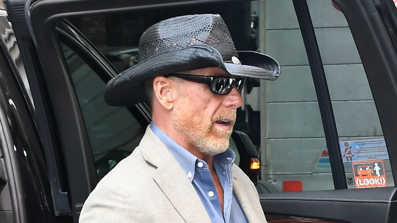 Shawn Michaels attempting the cowboy hat and sunglasses look