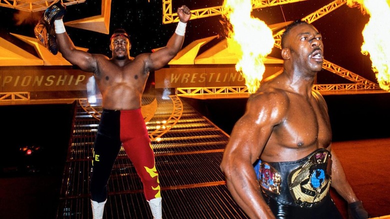 Stevie Ray and Booker T making their way to the ring during an episode of 