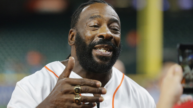 Booker T wearing his WWE Hall of Fame rings