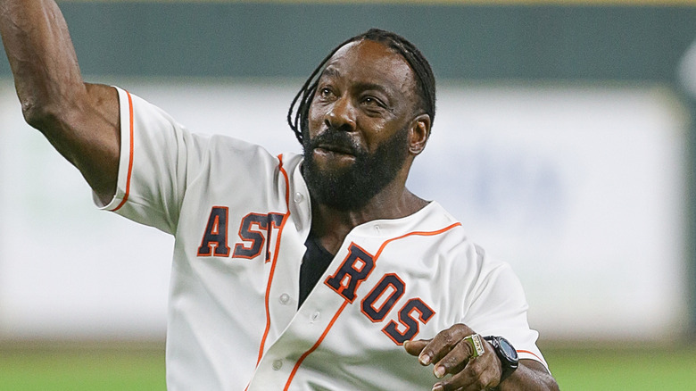 Booker T throws a baseball