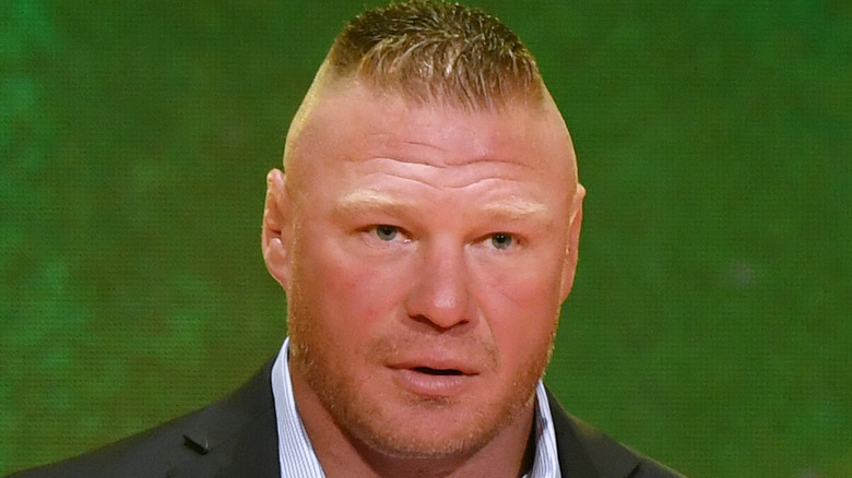 Brock Lesnar speaking during a press conference 