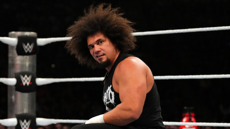 Carlito kneeling in the ring