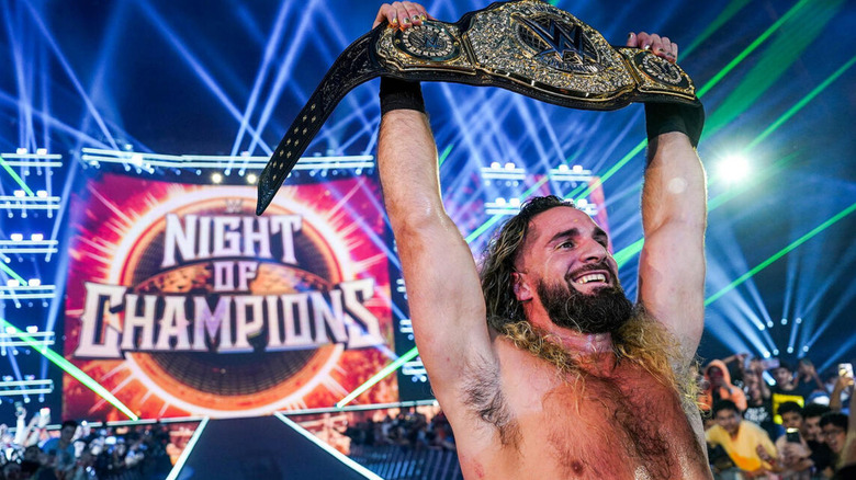 Seth Rollins shows off his World Heavyweight Championship
