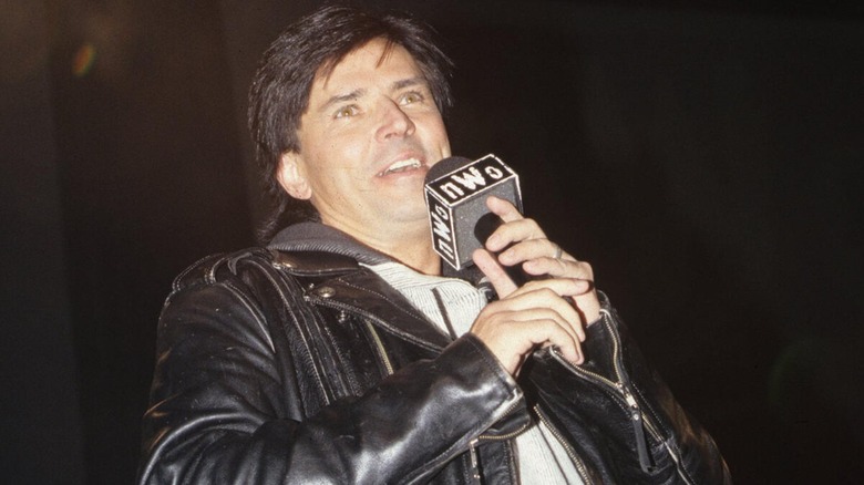 Eric Bischoff addressing the crowd during a WCW show.