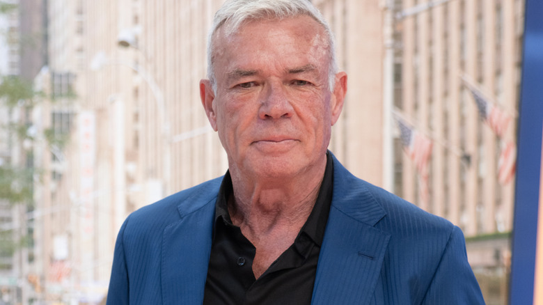 Eric Bischoff is wearing a suit