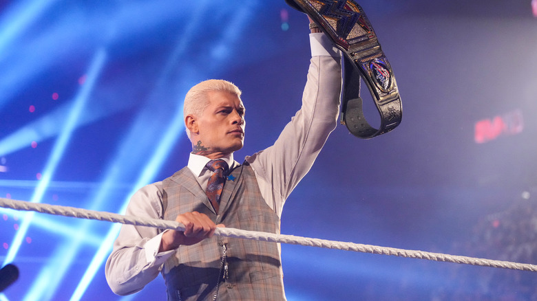Cody Rhodes holds his title high